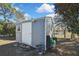 Functional backyard shed offers additional storage space, enhancing the property's appeal at 4206 Candler Ave, Spring Hill, FL 34609