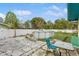 Spacious backyard with a patio, above-ground pool, and well-maintained landscaping at 4544 Cynthia Ln, Spring Hill, FL 34606