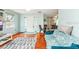 Cozy living area with hardwood floors, comfortable seating, and natural light at 4544 Cynthia Ln, Spring Hill, FL 34606
