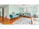Inviting living room featuring hardwood floors and stylish, comfortable seating at 4544 Cynthia Ln, Spring Hill, FL 34606