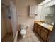 A quaint bathroom featuring a shower and vanity at 5319 Ray Dr, Weeki Wachee, FL 34607