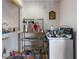 A cluttered kitchen featuring a sink and oven at 5319 Ray Dr, Weeki Wachee, FL 34607