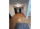 A well lit living room featuring hardwood floors at 5319 Ray Dr, Weeki Wachee, FL 34607