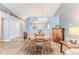 This dining room features a wood table and chairs and a pendant light at 6036 Dorset Rd, Spring Hill, FL 34608