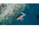 Aerial view of kayaker observing manatees in the clear waters at 6183 Waverly Rd, Weeki Wachee, FL 34607