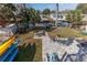 Backyard featuring a patio, fire pit, kayaks, and waterfront access at 6183 Waverly Rd, Weeki Wachee, FL 34607