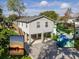 Charming stilted home featuring a spacious driveway and potential waterfront views at 6183 Waverly Rd, Weeki Wachee, FL 34607