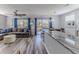 Modern kitchen boasts granite countertops, stainless steel appliances, and overlooks the dining and living area at 6183 Waverly Rd, Weeki Wachee, FL 34607