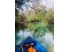 Beautiful clear water, seen from a blue kayak with trees along a natural river at 6183 Waverly Rd, Weeki Wachee, FL 34607