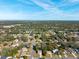 Overhead view of the neighborhood featuring well-maintained homes and established landscaping at 6209 Radford St, Spring Hill, FL 34606