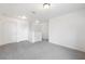 Bright loft featuring neutral carpeting, fresh paint, and ample natural light at 6209 Radford St, Spring Hill, FL 34606