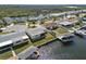 Waterfront homes featuring private docks and boat lifts for easy access to the water at 6627 Leeside Isle, Hudson, FL 34667