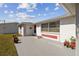 Charming single-story home with a well-maintained lawn and attractive front entryway at 6627 Leeside Isle, Hudson, FL 34667