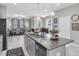 Open-concept living space with kitchen, dining, and living areas at 6741 Citrus Creek Ln, Tampa, FL 33625