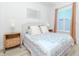 Inviting bedroom with a comfortable bed, side tables, and natural light from the windows at 700 S Harbour Island Blvd # 807, Tampa, FL 33602