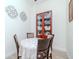 Bright dining area with a table, four chairs, decorative cabinet, and neutral decor at 700 S Harbour Island Blvd # 807, Tampa, FL 33602