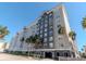 Multi-story condominium with palm trees, secure parking, and a modern architectural design at 700 S Harbour Island Blvd # 807, Tampa, FL 33602