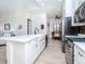 Open-concept kitchen boasts a large island, modern appliances, and adjacent dining area at 700 S Harbour Island Blvd # 807, Tampa, FL 33602