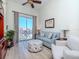 Living room featuring modern furnishings, natural light, and access to a balcony with city views at 700 S Harbour Island Blvd # 807, Tampa, FL 33602