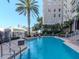 Inviting pool area with lounge chairs and lush greenery offering a tranquil retreat at 700 S Harbour Island Blvd # 807, Tampa, FL 33602