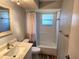 Updated bathroom features a shower-tub combination with white subway tile surround at 7106 Green Abbey Way, Spring Hill, FL 34606