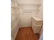 Walk-in closet with wire shelving and a two-drawer dresser for optimal organization at 7106 Green Abbey Way, Spring Hill, FL 34606
