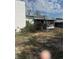 Exterior view of the house with a screened patio at 7278 Lamplighter St, Spring Hill, FL 34606