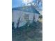 Exterior of the property featuring a yard and siding at 7278 Lamplighter St, Spring Hill, FL 34606