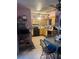 Kitchen with a dining area, showing functionality for meal prep and dining, enhancing the home's appeal for cooking enthusiasts at 7278 Lamplighter St, Spring Hill, FL 34606