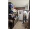 Mud room with storage and decor accents, but needs decluttering and improved organization at 7278 Lamplighter St, Spring Hill, FL 34606