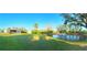 Expansive backyard featuring a serene pond with fountain, shed, and partial screened in porch at 9512 Sunshine Blvd, New Port Richey, FL 34654
