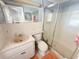 Bathroom featuring a sink with vanity and a glass enclosed shower at 9512 Sunshine Blvd, New Port Richey, FL 34654