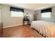 Bedroom with a black vanity desk and good natural light at 9512 Sunshine Blvd, New Port Richey, FL 34654