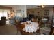 Comfortable living room featuring plush seating and a dining area, perfect for relaxation and entertaining at 11140 Carriage Hill Dr # 3, Port Richey, FL 34668
