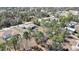Picturesque aerial shot of a property backing up to dense trees giving additional privacy from neighbors at 11257 Frigate Bird Ave, Weeki Wachee, FL 34613