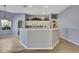 Open kitchen features bright cabinets, spacious counters and neutral walls at 11257 Frigate Bird Ave, Weeki Wachee, FL 34613