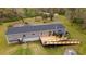 Aerial view of the property highlighting its extensive decking and outdoor space at 13024 Mohican Ave, New Port Richey, FL 34654