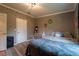 Cozy bedroom featuring a large bed, neutral walls, and decorative accents, creating a relaxing atmosphere at 13024 Mohican Ave, New Port Richey, FL 34654