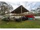 This property features a convenient carport for storing your vehicles and equipment outdoors at 13024 Mohican Ave, New Port Richey, FL 34654