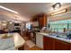 Well-equipped kitchen with modern appliances and plenty of counter space at 13024 Mohican Ave, New Port Richey, FL 34654