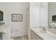 Bright half bath with tiled floors, toilet, and vanity with neutral color palette at 18129 Baywood Forest Dr, Hudson, FL 34667
