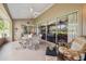 Spacious patio area with ample seating for outdoor dining and relaxation at 18129 Baywood Forest Dr, Hudson, FL 34667