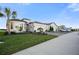 Beautiful home exterior on a cul-de-sac with paver driveway and three car garage at 19742 Sea Glass Cir, Land O Lakes, FL 34638