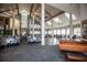 A banquet hall showcasing elegant tables, high ceilings, large windows, and a spacious dance floor at 2641 Royal Ridge Dr, Spring Hill, FL 34606