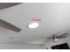 Ceiling features a skylight and ceiling fan in the living room to provide natural light at 2641 Royal Ridge Dr, Spring Hill, FL 34606