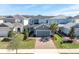 Charming two-story home with a brick driveway, well-manicured lawn, and lovely landscaping at 2830 Dudley Ave, Odessa, FL 33556
