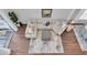 Aerial view of a spacious living room featuring soaring ceilings and sliding glass doors to the backyard at 2830 Dudley Ave, Odessa, FL 33556