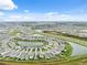 Breathtaking aerial view of the community featuring multiple ponds at 30845 Penny Surf Loop, Wesley Chapel, FL 33545