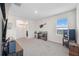 Upstairs bonus room with carpet and a window, great for a game room or office at 30845 Penny Surf Loop, Wesley Chapel, FL 33545
