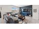 Relaxing living room provides a cozy space with natural light, comfortable seating, and stylish decor at 30845 Penny Surf Loop, Wesley Chapel, FL 33545